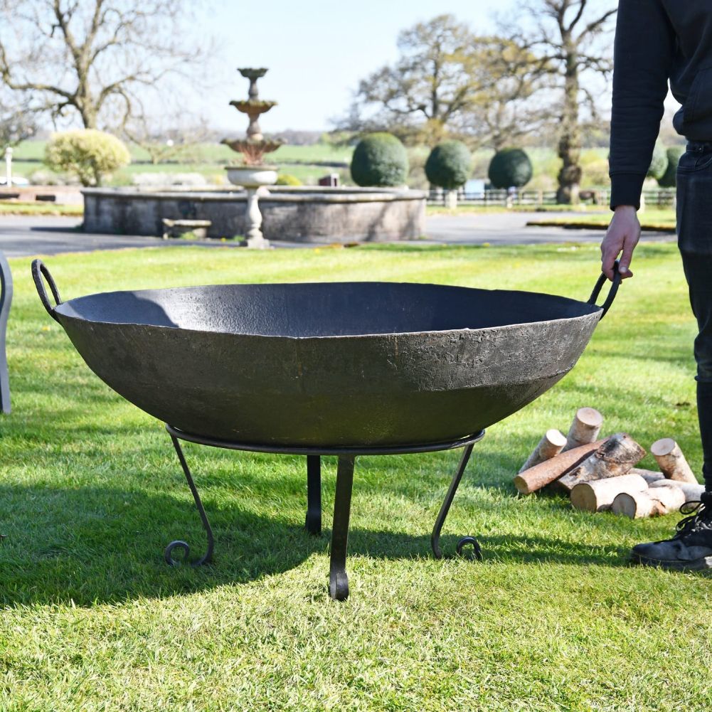 Iron Kadai Bowl in Garden Setting with Handles Up 