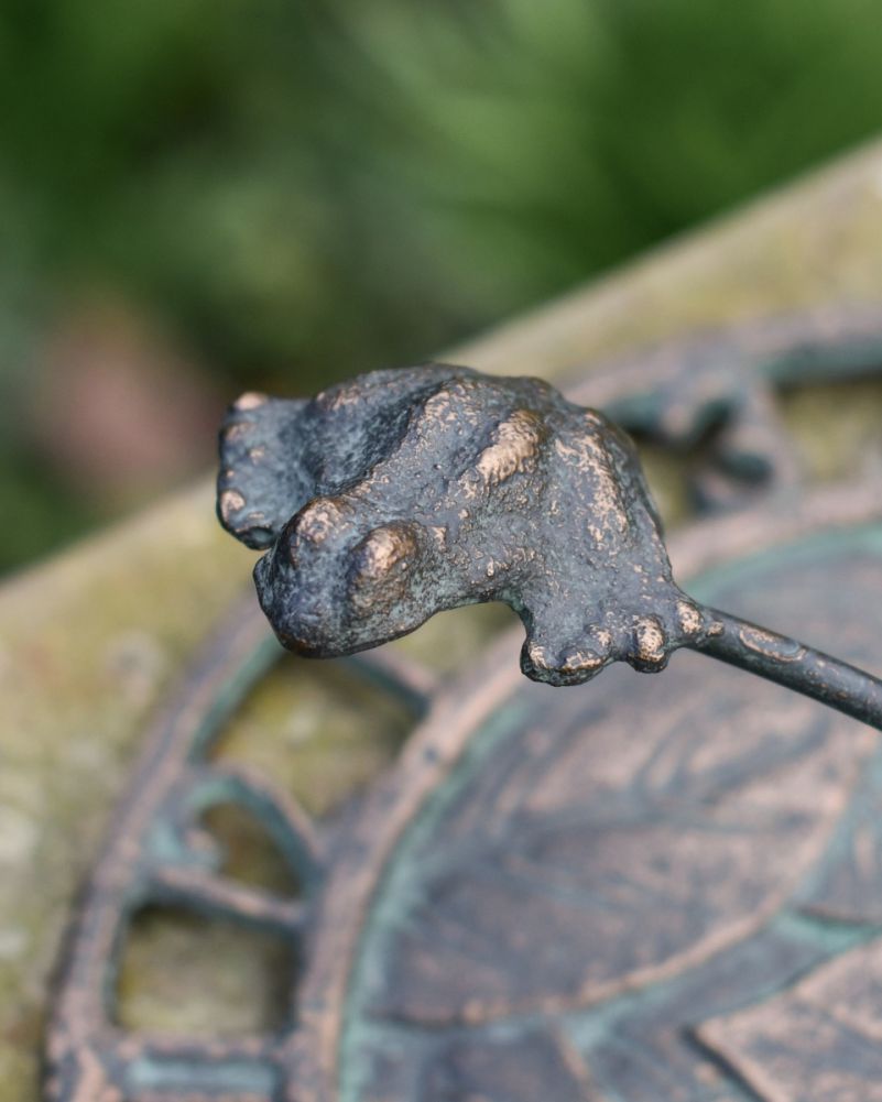 Aged Iron Sundial With Leaping Frog