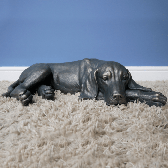 Antique Bronze Finish Laying Dog Sculpture Front View