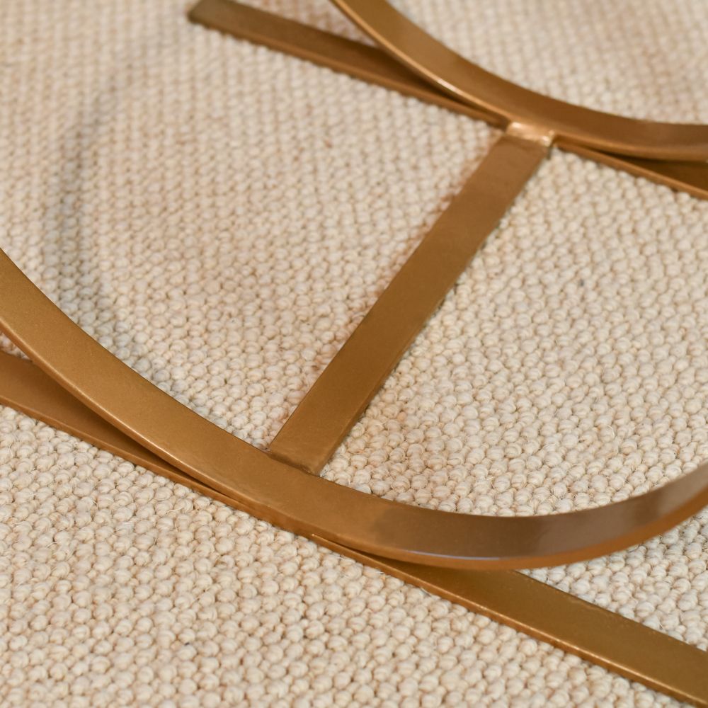 Base Of The Curved Log Rack In Bronze