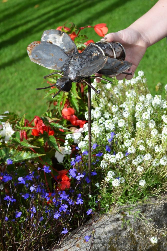 Bee on a spike garden sculpture