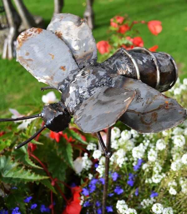 Bee on a spike garden sculpture