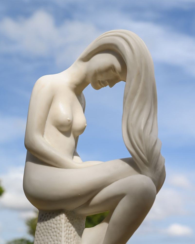 close Up Of the White Resin Contemporary 'Alba Serene' Garden Sculpture