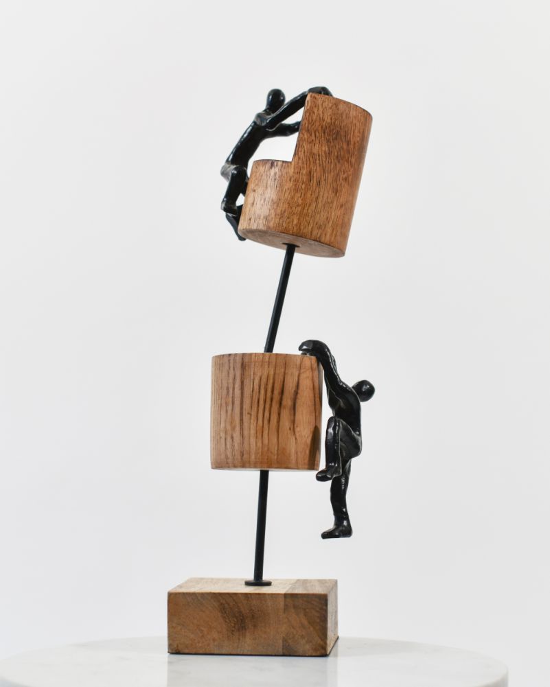 Black 'Reaching New Heights' Sculpture