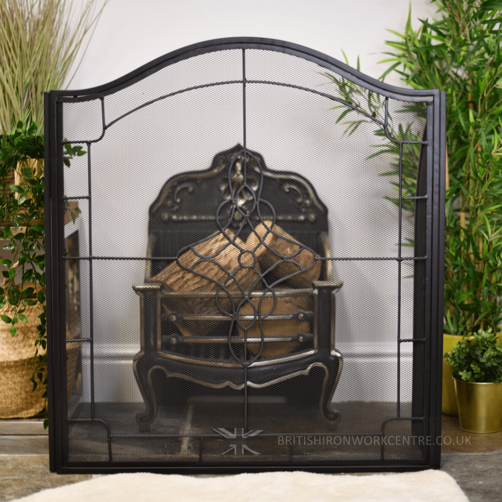 “Starkstone” Arched Fire Screen in Front of Fire