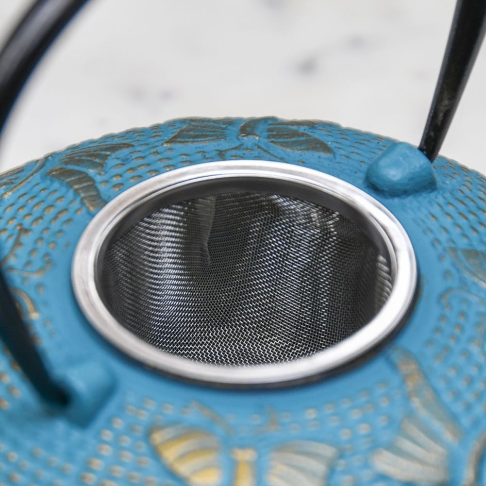 Close Up Of Cast Iron Cyan Japanese Teapot Strainer