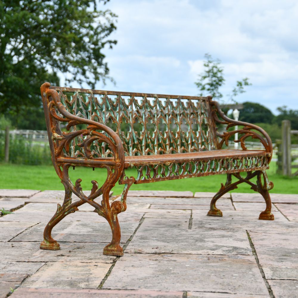 Side Of The Rustic Quatrefoil Victorian Cast Iron Three Seat Bench