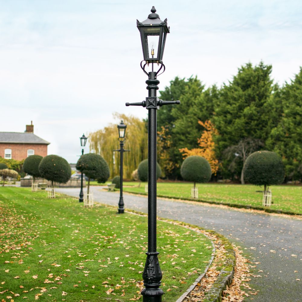 Classic Black Victorian Lamp Post On Driveway