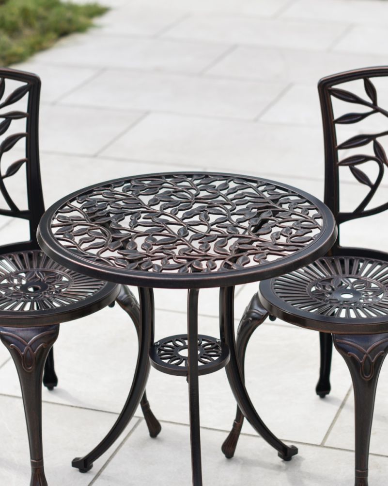 Close Up Of Copper Bistro Set In Situ On Patio