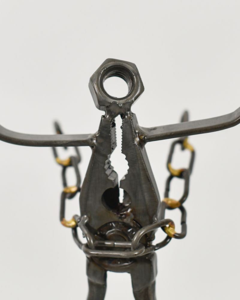 Close Up Of The Breaking Free Scrap Metal Art 