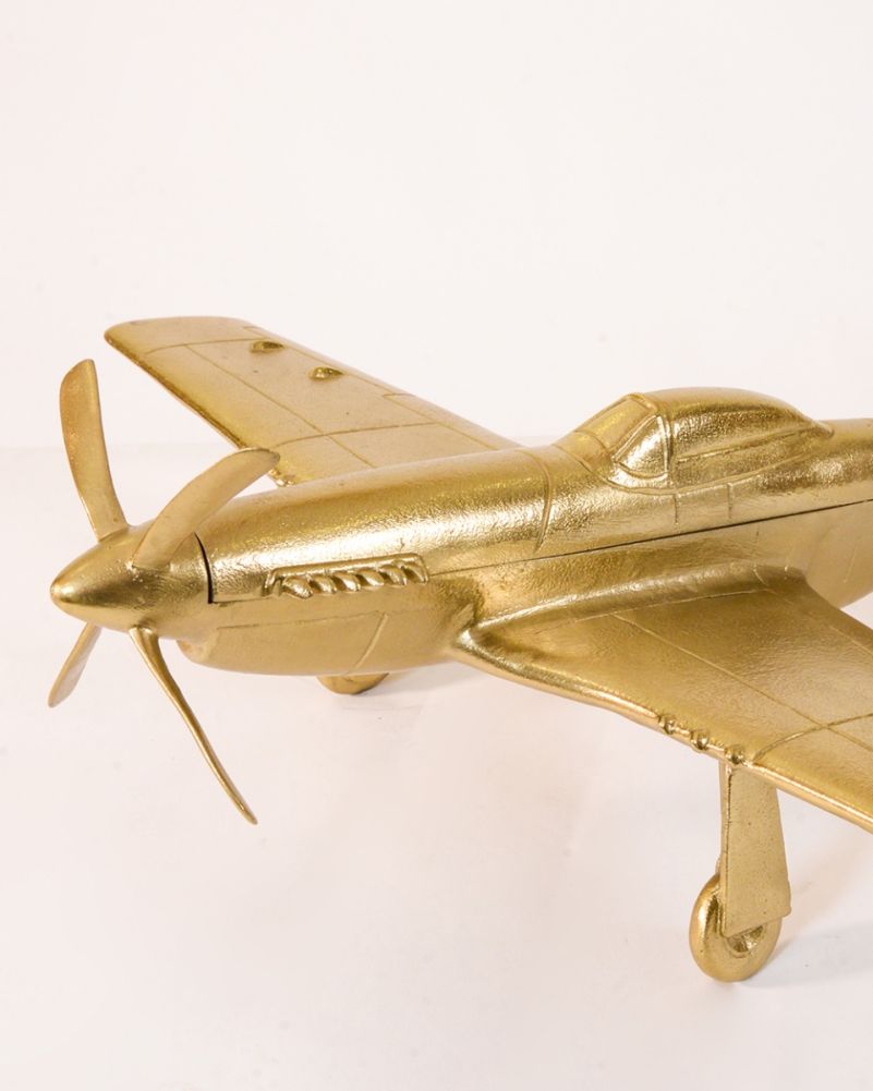 Close Up Of The Mustanf Plane Ornament Finished In Bright Gold