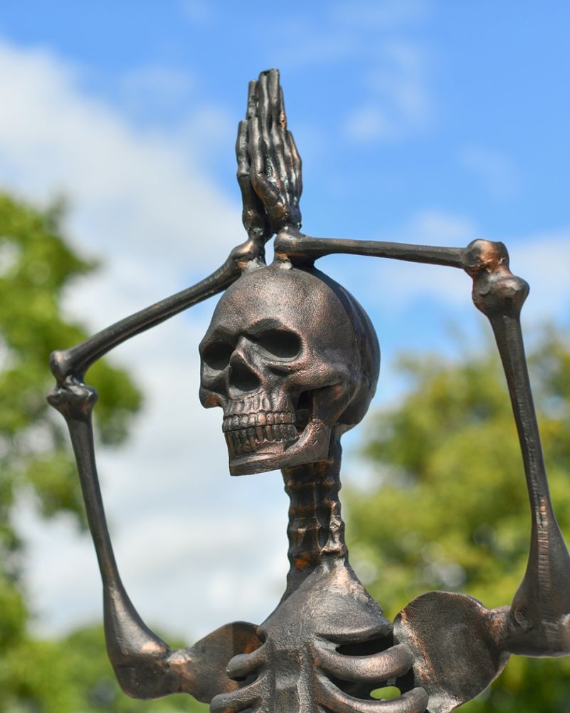 Close Up Of The Tranquil Aluminium Skeleton Sculpture