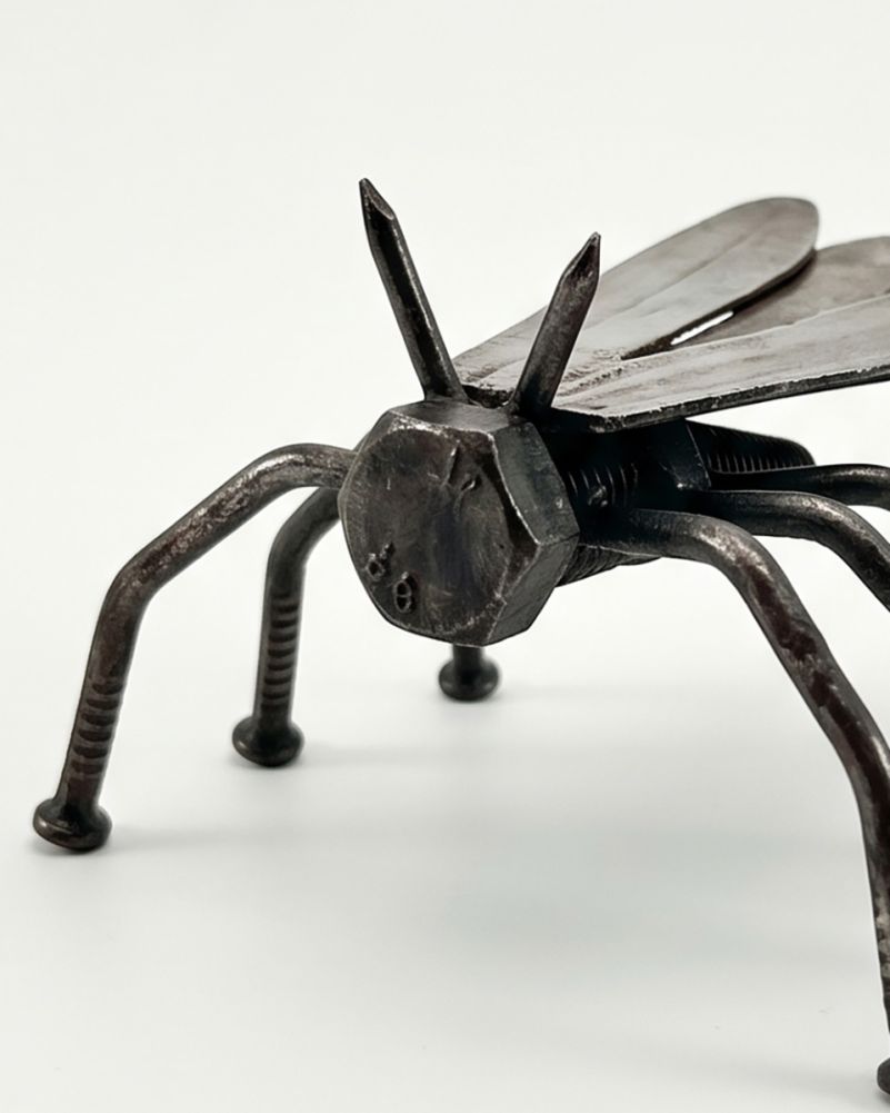 Close Up of The Winged Scavenger Fly Scrap Metal Art Sculpture Digital Illustration