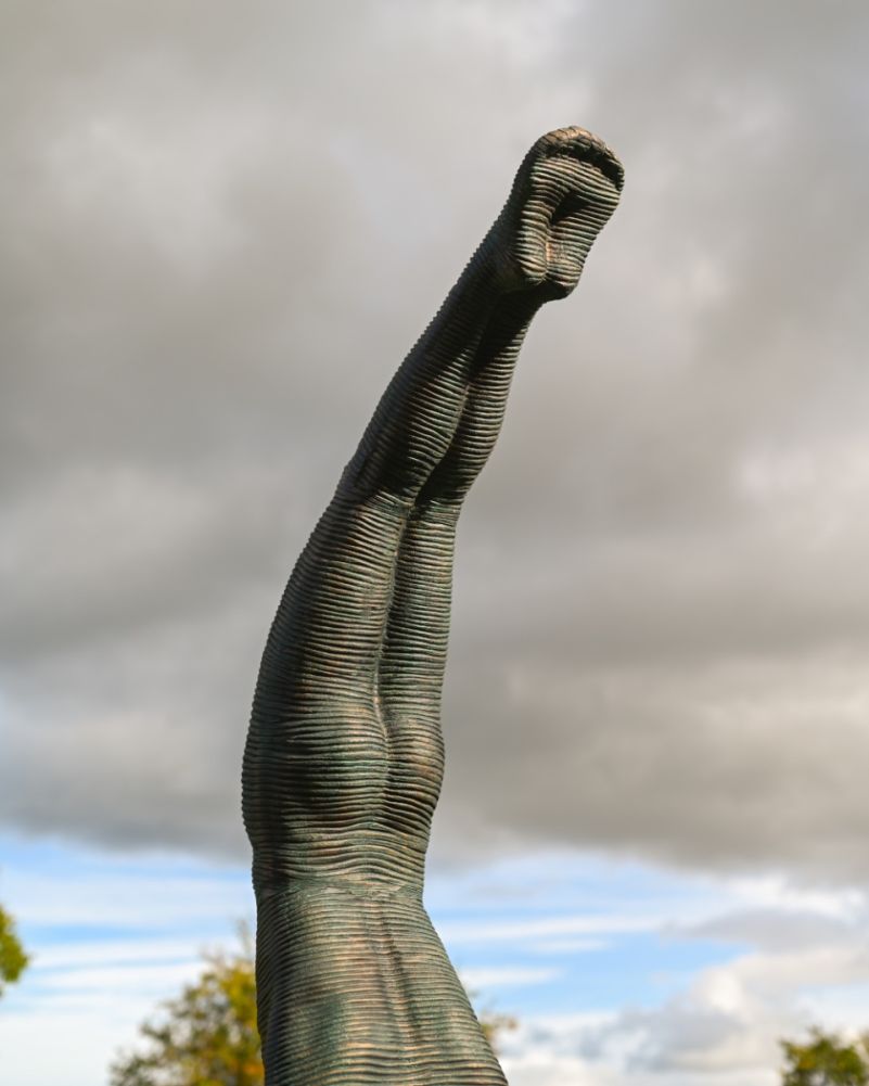 contemporary metal acrobat lawn ornament