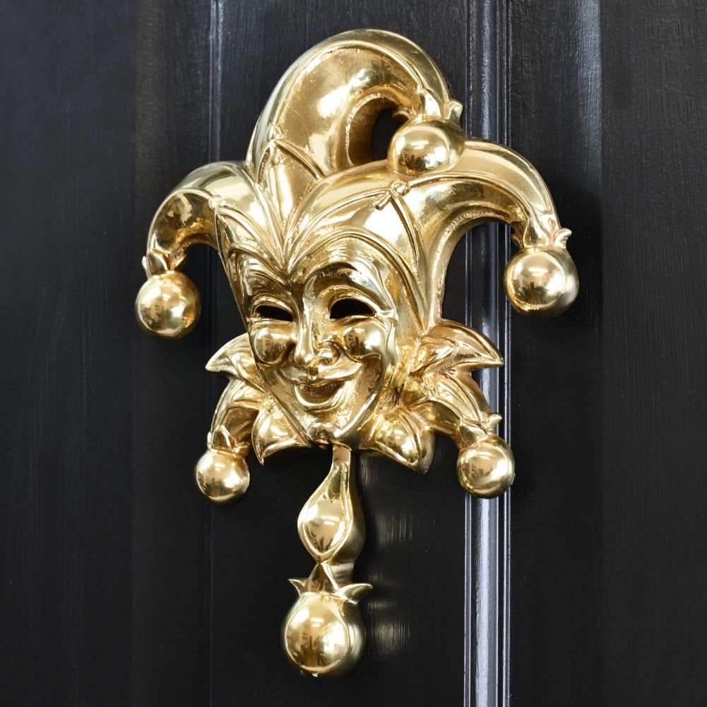 Jester Door Knocker - Polished Brass Finish on Black Door