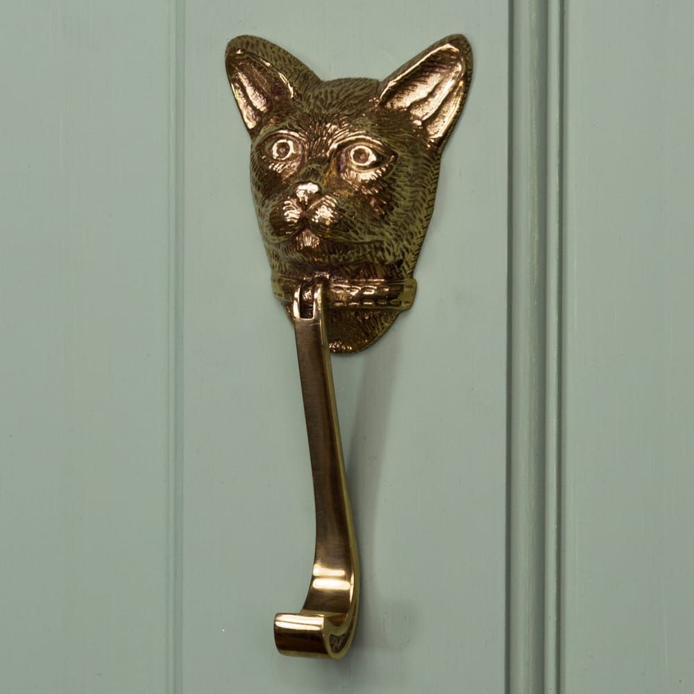 Cat Door Knocker In Polished Brass on Green Door 