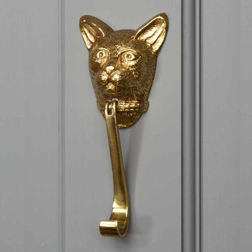 Cat Door Knocker In Polished Brass on Grey Door 