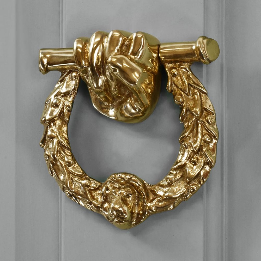 Polished Brass Royal Laurel Wreath Door Knocker on Grey Door