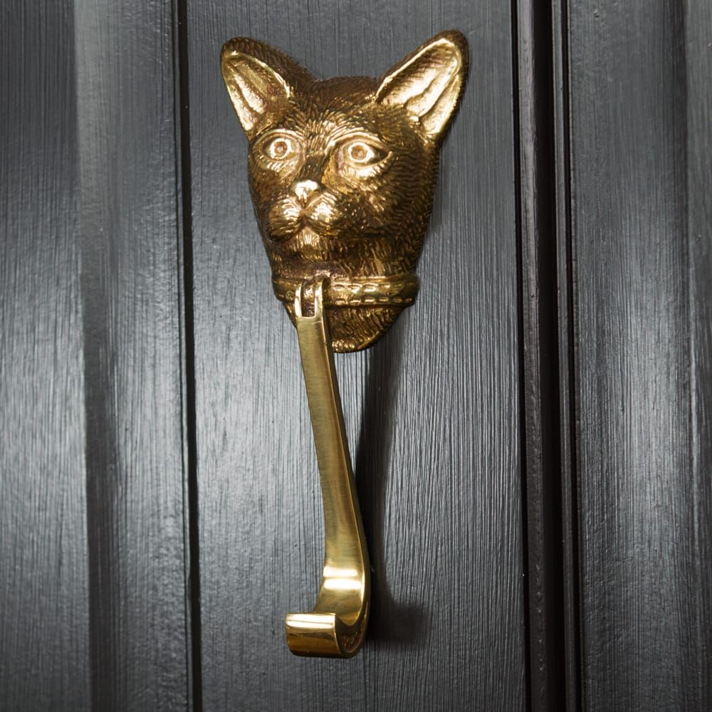 Cat Door Knocker In Polished Brass on Black Door 