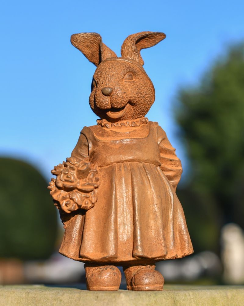 Rustic cast iron rabbit sculture front view 