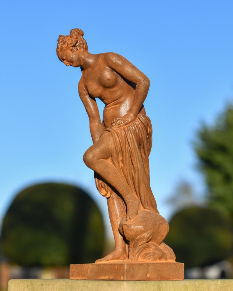 Rustic Cast Iron Lady On The Riverside Rocks 