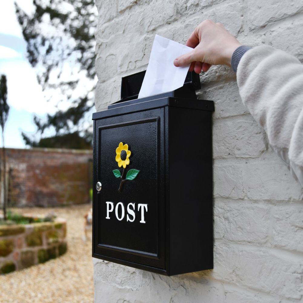 Black Post Box with Sunflower Motif on Wall 