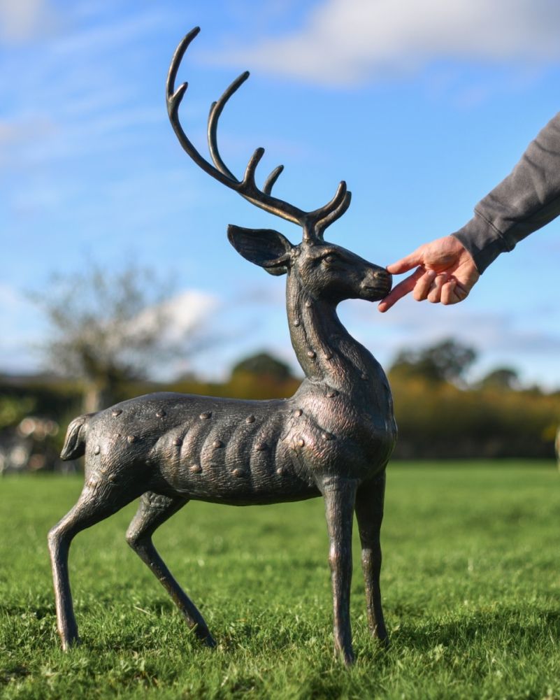 Ely cast aluminium buck garden sculpture with hand for scale