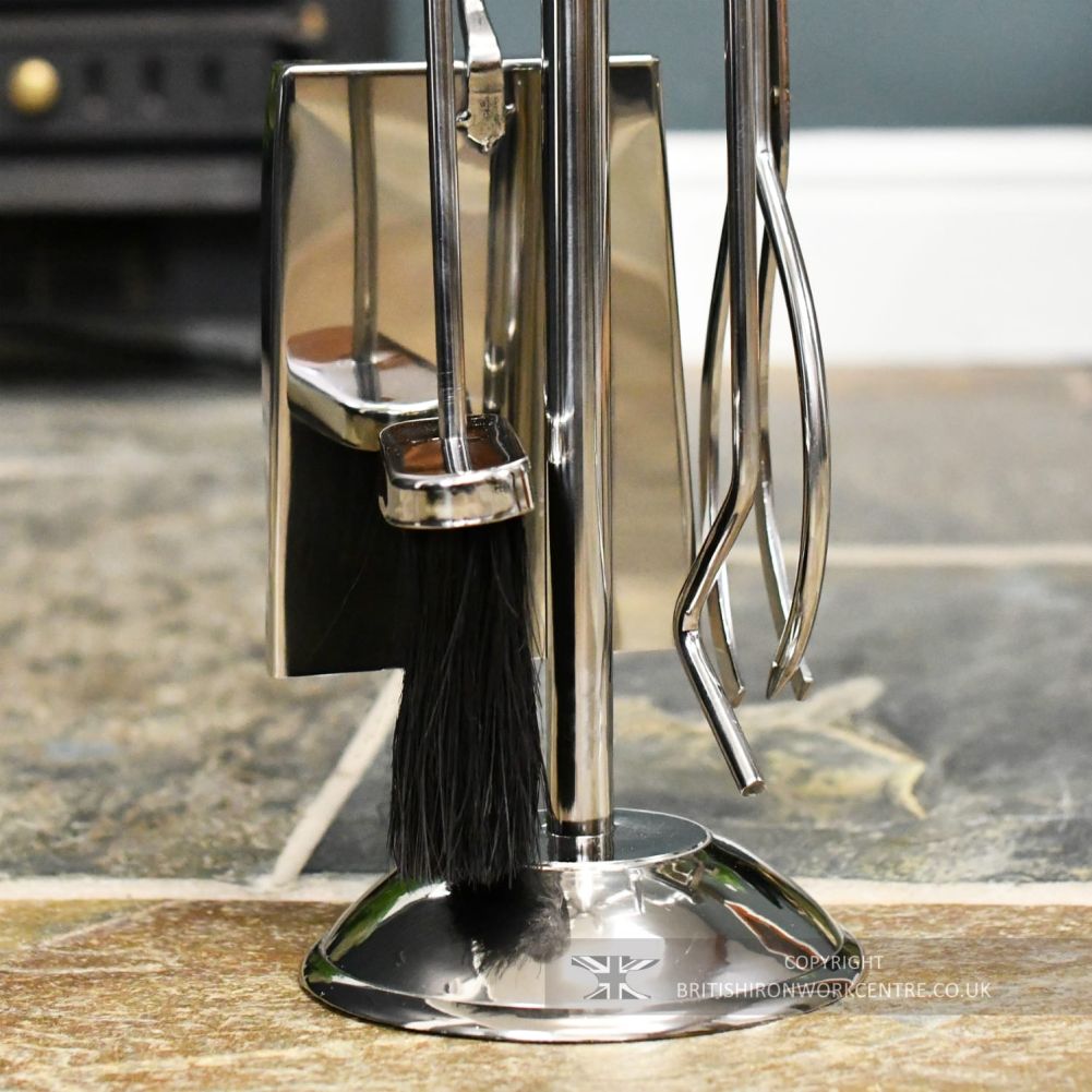 close up of tools on classic polished steel companion set 