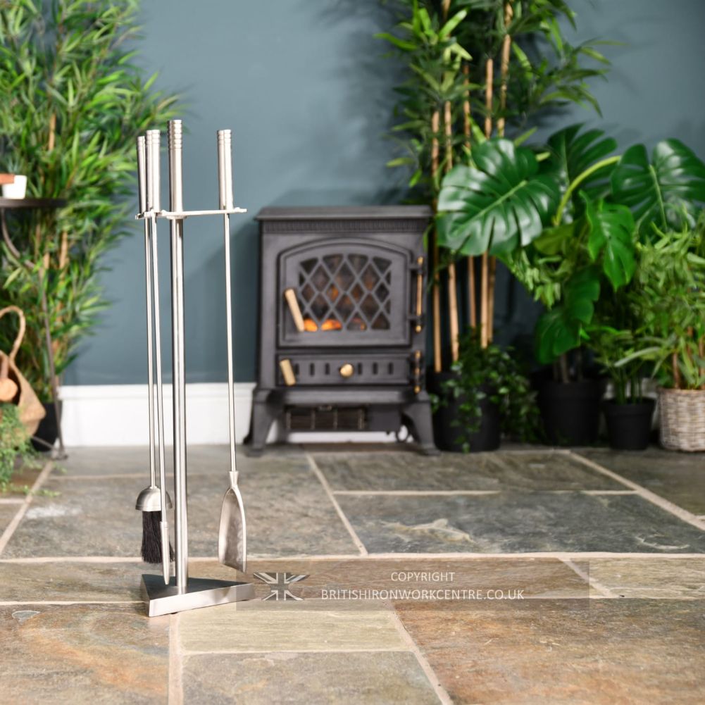 Modern 'Art Deco' Stainless Steel Companion Set 66.5cm to the left of burner
