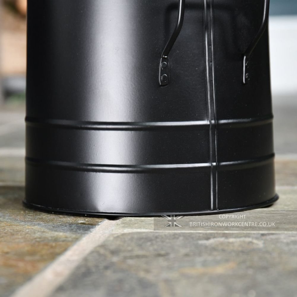 Simplistic Black Coal Bucket close up of the bottom 