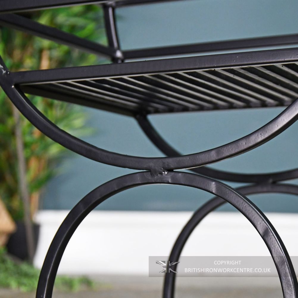 Regal Black Iron Curved Log Holder close up of legs