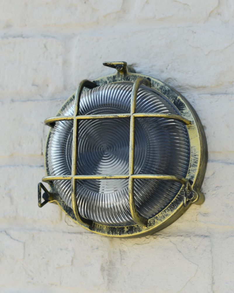 Close Up Of The Brushed Brass 'Caspian' Round Nautical Bulkhead Wall Light