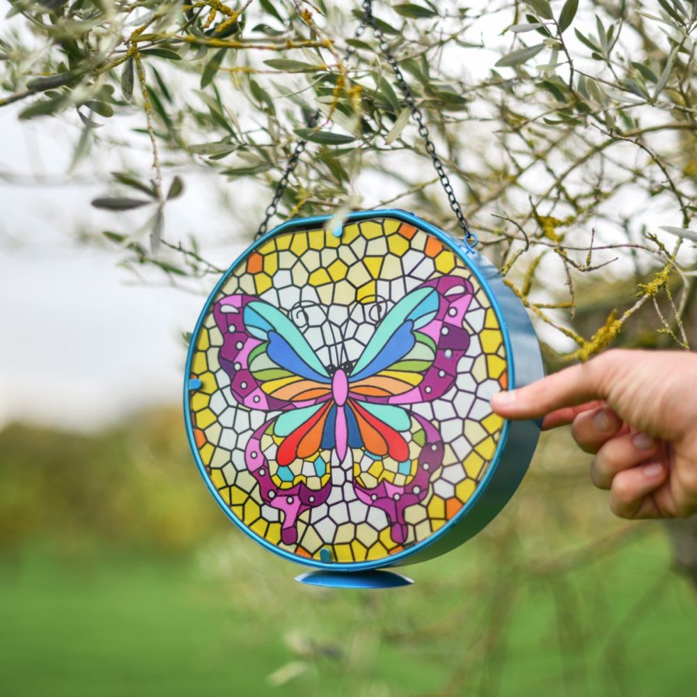Scale Shot Of Glass Butterfly Hanging Solar Light