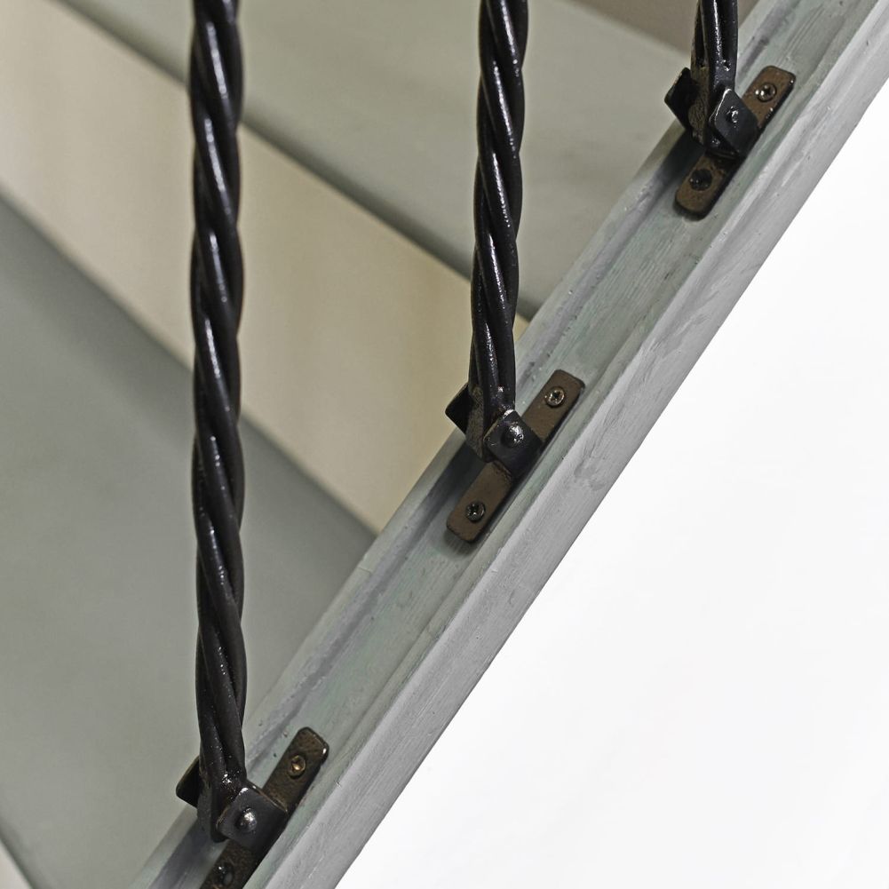 Riveted Brackets on the Stair Spindles Attached to the Stairs