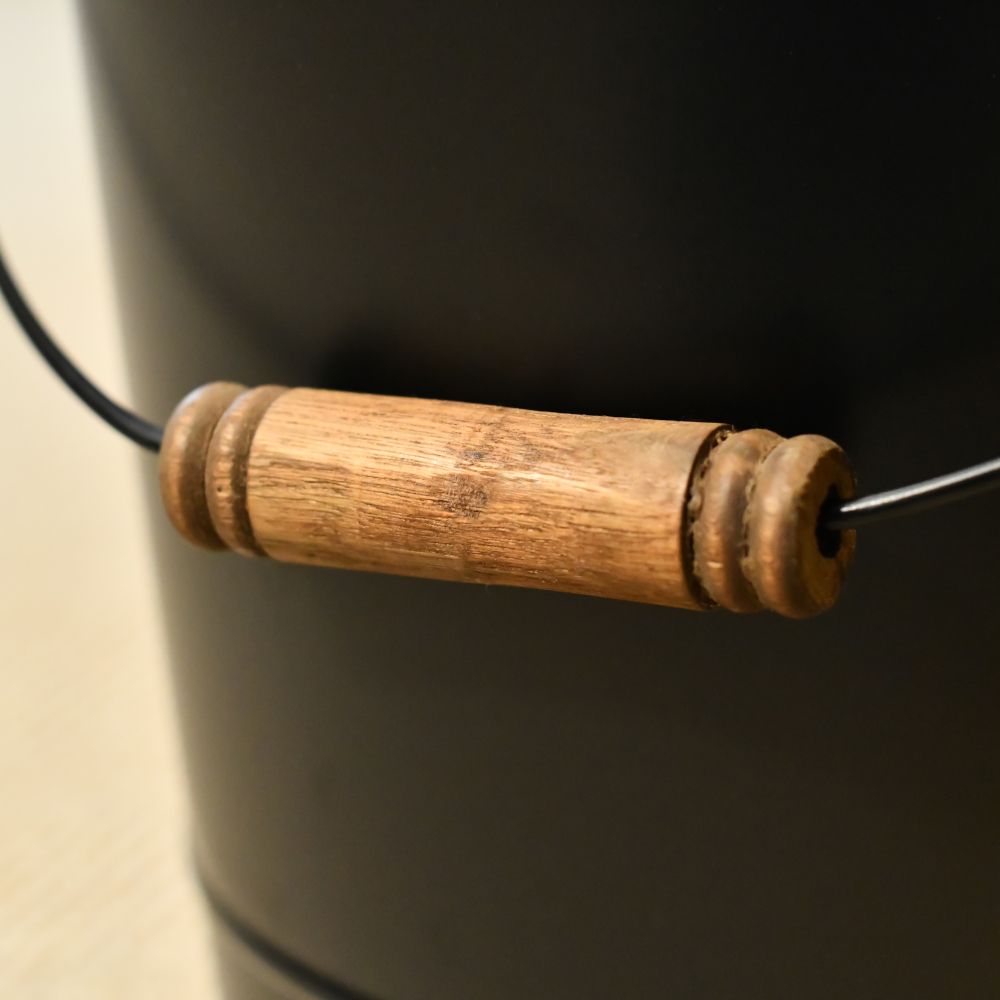 Wooden Handle On The Simple Black Ash Bucket