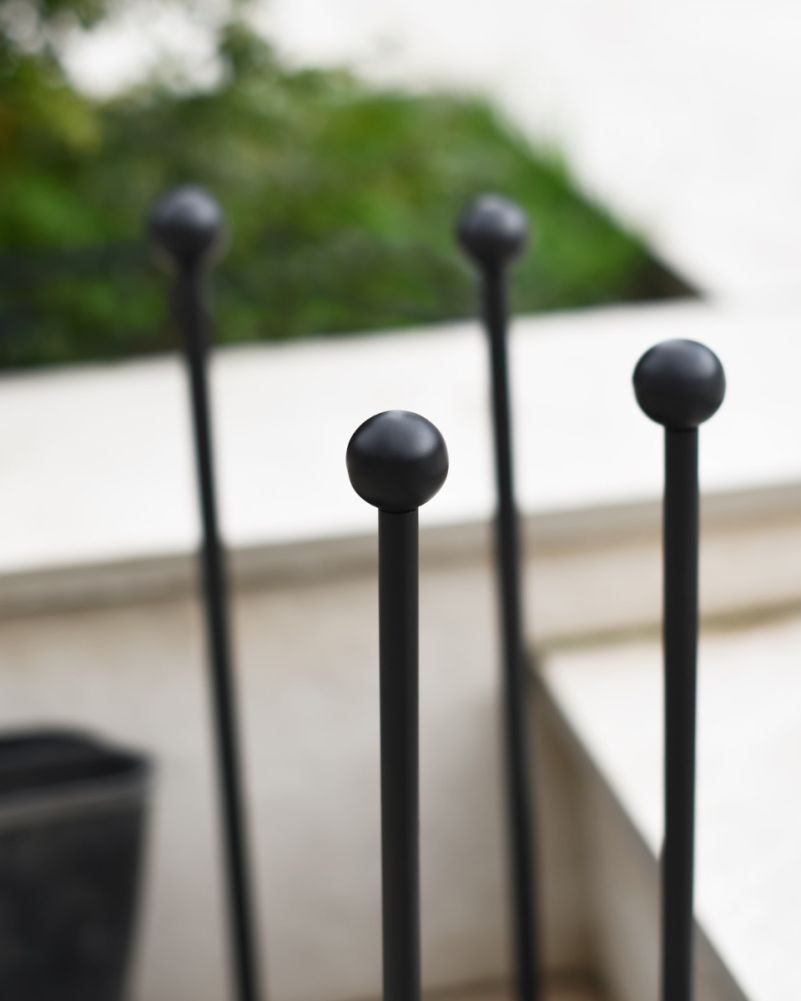 Close Up Of Horse Head Boot Stand & Scraper In Black Prongs