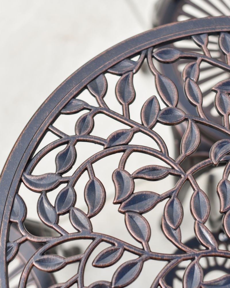 Intricate Leaf Pattern On Copper Garden Tabletop