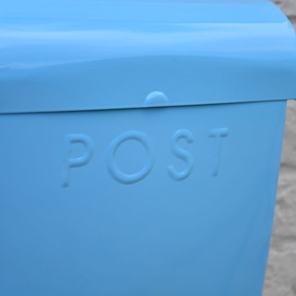 Close up of 'POST' lettering in sky blue finish
