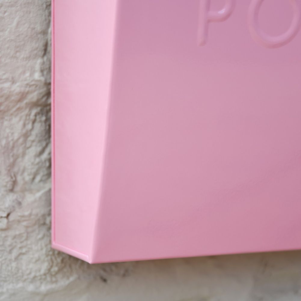 Close up of metal work and pink finish 