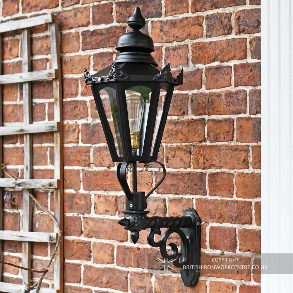 Small Black Hexagonal Lantern with Royale Bracket on Brick Wall