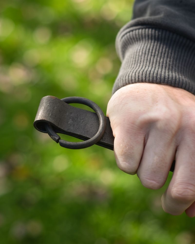Close Up Of The Loop On The Iron BBQ Cooking Tongs