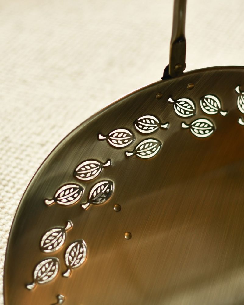 Close-Up of Leaf Pattern on Looped Handle Antique Brass Log Store