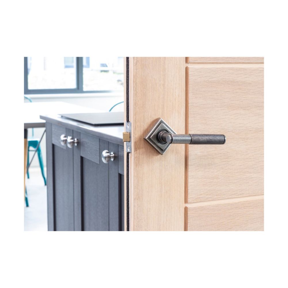 Modern Pewter Textured Lever Door Handle on Square Rose On the Door