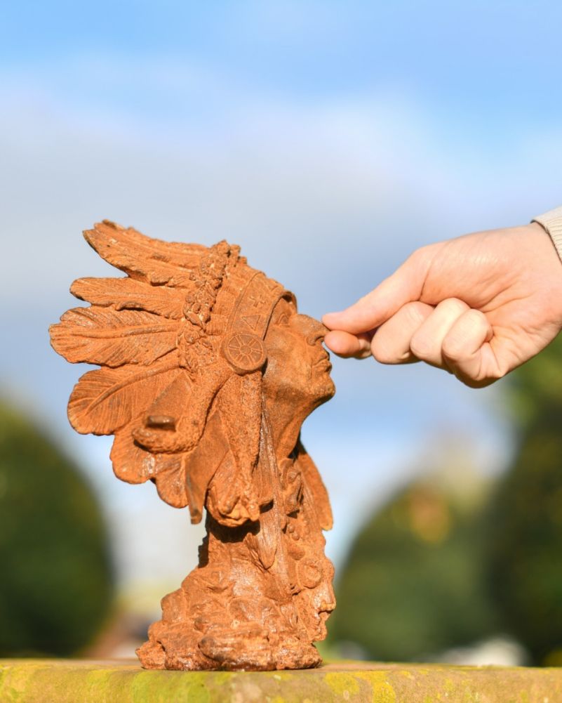 Scale Shot Of Rustic Cast Iron Native American Bust Sculpture