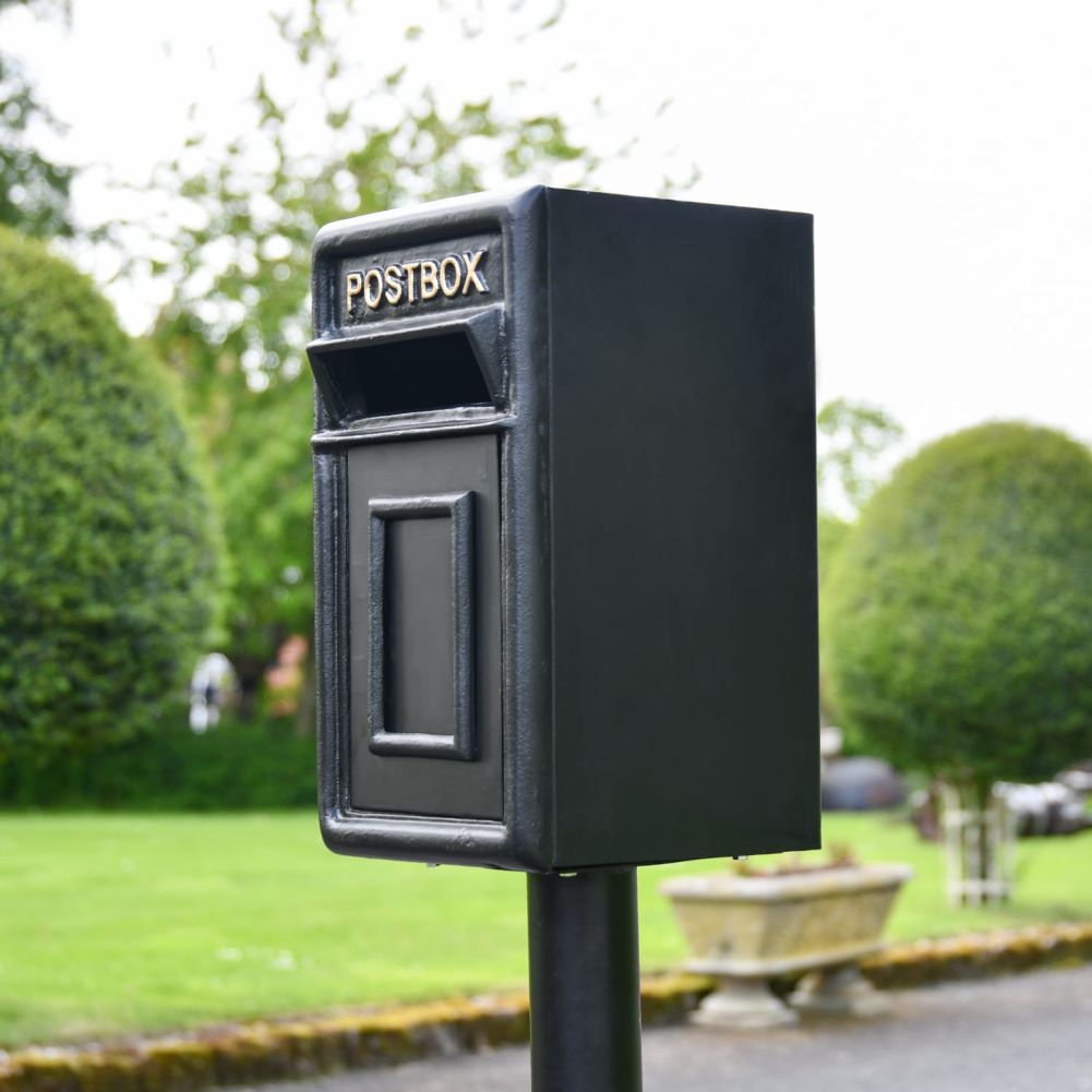Black and Gold Traditional Iron Post Box With Stand Side View
