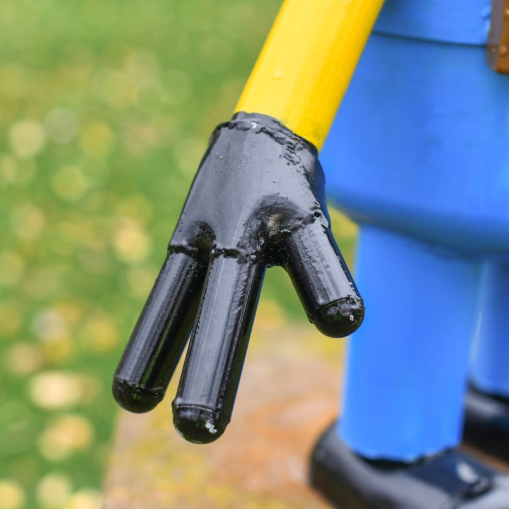 Close Up Of Scrap Metal Revolutionist Mini Monster Hands