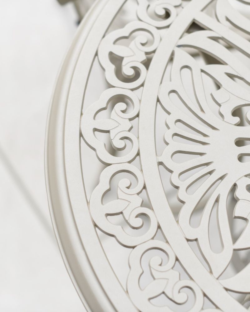 Scrollwork Design On Garden Tabletop
