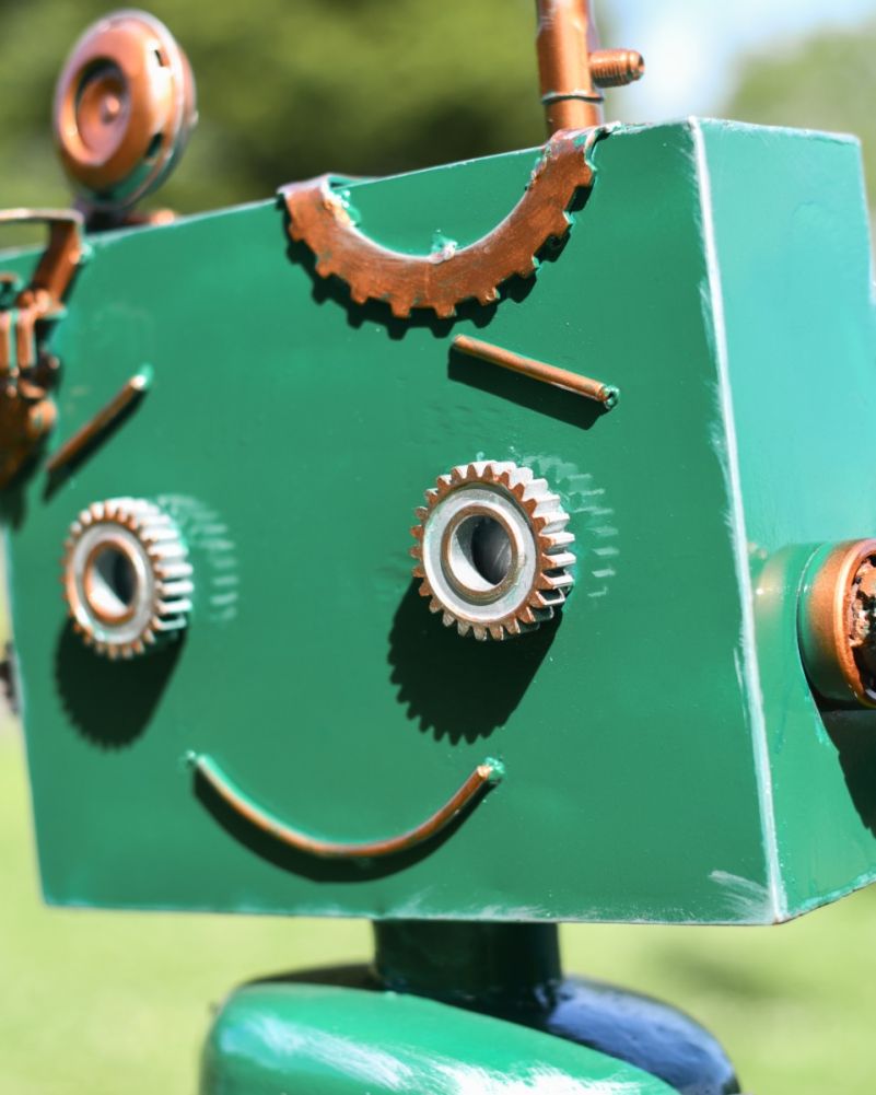 Side Profile Of Green Robots Face 