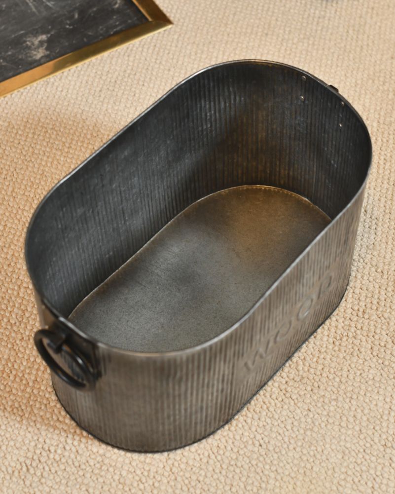 Above The Ribbed Natural Steel Log Basket 