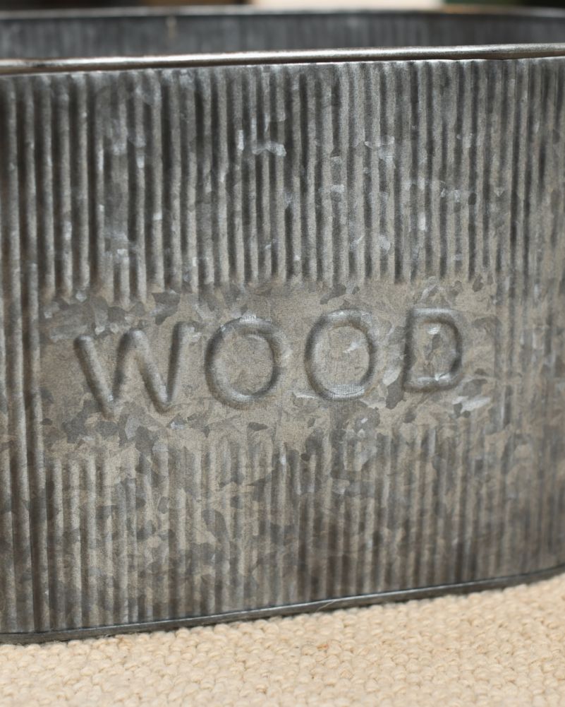 Motif from the Ribbed 'Farnhill' Natural Steel Log Basket 